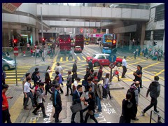 Busy intersection at  Des Voeux Road..